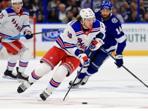 Artemi Panarin of the New York Rangers looks to pass during a game against the Tampa Bay Lightning at Amalie Arena on November 14, 2019 in Tampa, Florida.