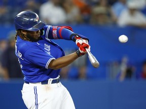 Vladimir Guerrero Jr. of the Toronto Blue Jays hits a double in the sixth inning during a MLB game against the Baltimore Orioles at Rogers Centre on June 16, 2022 in Toronto, Ontario, Canada.