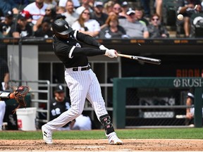 Luis Robert of the Chicago White Sox hits an RBI single in the third inning against the Baltimore Orioles at Guaranteed Rate Field on June 25, 2022 in Chicago, Illinois.