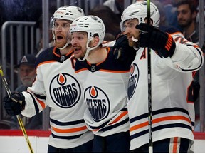 Zach Hyman #18 of the Edmonton Oilers celebrates with his teammates after scoring a goal on Darcy Kuemper #35 of the Colorado Avalanche during the first period in Game One of the Western Conference Final of the 2022 Stanley Cup Playoffs at Ball Arena on May 31, 2022 in Denver, Colorado.