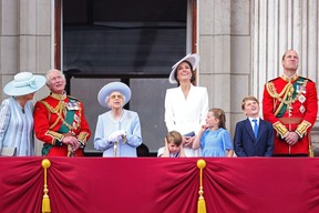 Camilla, Duchess of Cornwall, Prince Charles, Prince of Wales, Queen Elizabeth II, Prince Louis of Cambridge, Catherine, Duchess of Cambridge, Princess Charlotte of Cambridge, Prince George of Cambridge and Prince William, Duke of Cambridge on the balcony of Buckingham Palace during the Trooping the Colour parade on June 2, 2022 in London.