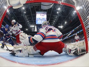 Igor Shesterkin of the New York Rangers stops a shot against  Brandon Hagel of the Tampa Bay Lightning in Game Three of the Eastern Conference Final of the 2022 Stanley Cup Playoffs at Amalie Arena on June 05, 2022 in Tampa, Florida.