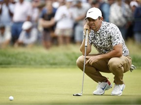 Rory McIlroy of Northern Ireland lines up a putt on the ninth green during round one of the 122nd US Open Championship at The Country Club on June 16, 2022 in Brookline, Massachusetts.