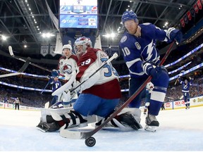 Corey Perry of the Tampa Bay Lightning scores a goal against Pavel Francouz of the Colorado Avalanche during the second period in Game Three of the 2022 NHL Stanley Cup Final at Amalie Arena on June 20, 2022 in Tampa, Florida.