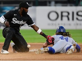 Bo Bichette of the Toronto Blue Jays steals second base in the fourth inning against Josh Harrison of the Chicago White Sox at Guaranteed Rate Field on June 21, 2022 in Chicago, Illinois.