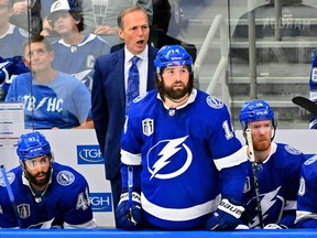 Head Coach Jon Cooper and Pat Maroon #14 of the Tampa Bay Lightning react during the third period against the Colorado Avalanche in Game Four of the 2022 NHL Stanley Cup Final at Amalie Arena on June 22, 2022 in Tampa, Florida.
