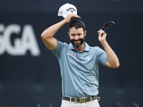 Canadian Adam Hadwin reacts on the ninth green during round one of the 122nd US Open Championship.
