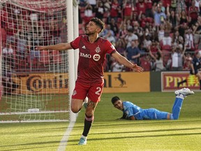 Toronto FC midfielder Jonathan Osorio (21) celebrates after scoring a goal against Atlanta United FC.