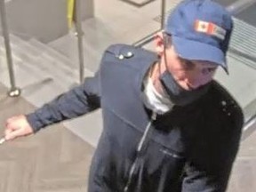 An image of the suspect in a robbery at an ATM on June 25, 2022 in the Dundas Street West and Huron Street area.