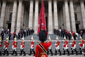 Members of the Life Guards, a regiment of the Household Cavalry, march during the National Service of Thanksgiving for The Queen’s reign at Saint Paul’s Cathedral in London on June 3, 2022 as part of Queen Elizabeth II’s platinum jubilee celebrations.
