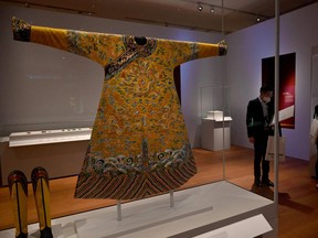 A festive robe from the Qing Dynasty Qianlong period (1736-1795) is displayed during a media preview of the Hong Kong Palace Museum in Hong Kong on June 22, 2022.