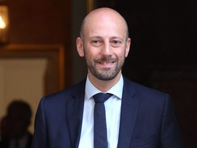 France's Minister of Transformation and Public Services and Renaissance general delegate Stanislas Guerini leaves after attending a weekly breakfast meeting of the presidential majority with the French Prime Minister, at the Hotel Matignon in Paris on June 28, 2022.