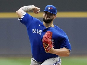 Blue Jays pitcher Alek Manoah delivers to the plate against the Brewers in the first inning at American Family Field in Milwaukee, Friday, June 24, 2022.