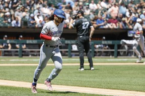 Blue Jays shortstop Bo Bichette rounds the bases after hitting a grand slam against the Chicago White Sox during the fourth inning at Guaranteed Rate Field. (Kamil Krzaczynski-USA TODAY Sports)
