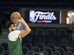 June 1, 2022; San Francisco, CA, USA; Boston Celtics forward Jayson Tatum (0) shoots the basketball during media day of the 2022 NBA Finals at Chase Center.