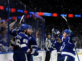 Nikita Kucherov (86) celebrates a goal with teammates Steven Stamkos (91) and Ondrej Palat after scoring on against the New York Rangers during Game 4 of the Eastern Conference final. All three players have spent their entire careers with the Lightning.