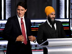 Justin Trudeau and Jagmeet Singh take part in a federal election debate in Gatineau, Que., Sept. 9, 2021.