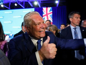 Ontario Premier Doug Ford gestures at his Ontario PC Party provincial election night watch party at the Toronto Congress Centre in Etobicoke June 2, 2022.