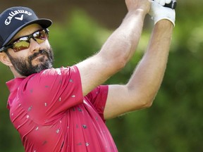 Canadian Adam Hadwin hits his tee shot on the 13th hole during round two of the Canadian Open at St. George's Golf and Country Club in Toronto on Friday, June 10, 2022.