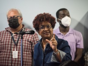 Beverly Bain from "No Pride in Policing Coalition" addresses Chief James Ramer of the Toronto Police Service, following an apology at a press conference releasing race-based data, at police headquarters in Toronto on Wednesday, June 15, 2022.