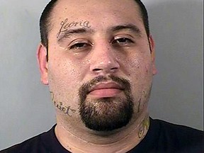 This photo provided by the California Department of Corrections and Rehabilitation shows Justin William Flores who is the alleged gunman in a Southern California shootout that killed two police officers on Tuesday, June 14, 2022 in El Monte, Calif. Flores was identified as the suspect by the Los Angeles County District Attorney's Office on Wednesday, June 15, 2022.