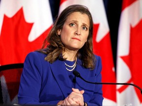 Finance Minister and Deputy Prime Minister Chrystia Freeland looks on during a news conference before delivering the 2022-23 budget, in Ottawa, April 7, 2022.