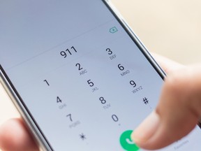 Dialing 911 on a smartphone.