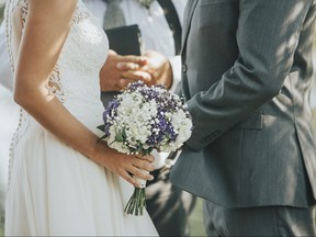 A bride and a groom have upset their wedding officiant.