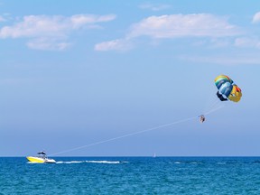 A stock image of parasailing.