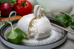 Handmade soft Italian cheese from Puglia. GETTY