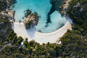 An aerial view of the beautiful Prince Beach (Spiaggia del Principe), a white sand beach bathed by a turquoise water in Sardinia, Italy. GETTY