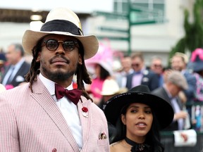NFL player Cam Newton watches an undercard race before the running of the 148th Kentucky Derby at Churchill Downs on May 07, 2022 in Louisville, Kentucky. (Photo by Gunnar Word/Getty Images)