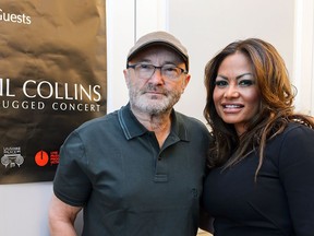 Britain's rock star Phil Collins (L) and his ex-wife Orianne Collins pose during a press conference for The Little Dreams Foundation gala concert on May 30, 2016 in Lausanne.
(FABRICE COFFRINI/AFP via Getty Images)