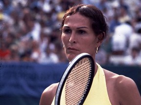 Transgender tennis player, Renee Richards, on the tennis court, July 1977. (Photo by Gaffney/Liaison)