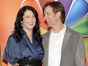 "Parenthood" cast members Lauren Graham and Peter Krause arrive for the NBC network upfront presentation at Radio City Music Hall, Monday, May 14, 2012 in New York.