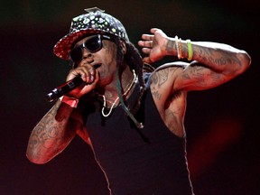 Rapper Lil Wayne performs during the 2015 iHeartRadio Music Festival at the MGM Grand Garden Arena in Las Vegas September 18, 2015