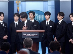 Members of the K-Pop band BTS (not in order) Kim Taehyung, Kim Seokjin, Jeon Jeongguk, Kim Namjoon, Park Jimin, Jung Hoseok and Min Yoon-gi makes statements against anti-Asian hate crimes and for inclusion and representation during the daily briefing at the White House in Washington, May 31, 2022.