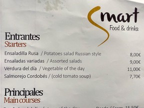 Russian salad is seen in a menu at the NATO summit media centre restaurant in Madrid, Spain, June 28, 2022.