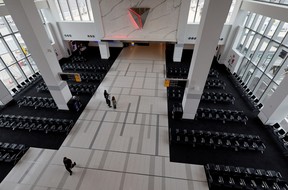 Delta Airlines employees walk through a gate area of the newly completed 1.3 million-square foot $4 billion Delta Airlines Terminal C at LaGuardia Airport in the Queens borough of New York City June 1, 2022. REUTERS/Mike Segar