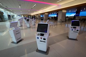 Check-in kiosks await travellers in ticketing area of the new 1.3 million-square foot $4 billion Delta Airlines Terminal C at LaGuardia Airport in the Queens borough of New York City June 1, 2022. REUTERS/Mike Segar