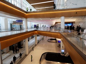 People walk through the newly completed 1.3 million-square foot $4 billion Delta Airlines Terminal C at LaGuardia Airport in the Queens borough of New York City June 1, 2022.