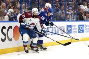 Avalanche forward Nazem Kadri, left, defends against Ondrej Palat of the Lightning during the third period in Game 4 of the Stanley Cup final at Amalie Arena in Tampa, Fla., Wednesday, June 22, 2022.