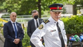 Toronto Police Chief James Ramer, joined by Toronto Police Association President Jon Reid (left) and Mayor John Tory outside Toronto City Hall on Friday, July 2 2021.
