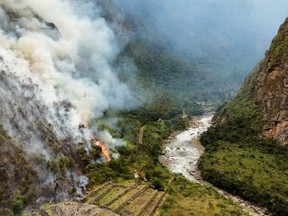 A forest fire burns in Machu Picchu, Peru, in this image released on June 29, 2022.