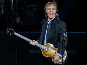 In this file photo taken on July 27, 2017 British musician Paul McCartney performs during a concert as part of his One on One tour at the Hollywood Casino Amphitheatre in Tinley Park, Illinois.