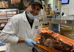 Dante Di Biase, owner of Ontario’s Globe Meats, with his familys special recipe porchetta – supplied photo