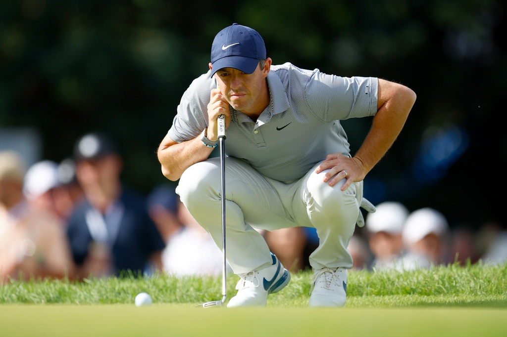 McIlroy, Finau lead Canadian Open as war for golf's future rages ...