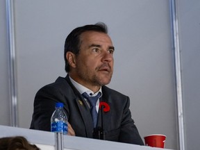 Hamilton Bulldogs president and general manager Steve Staios watching his team in the opening game of the Memorial Cup against the Saint John Sea Dogs are Harbour Station arena in Saint John, N.B., on June 20, 2022.