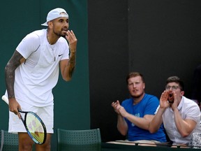 Australia's Nick Kyrgios reacts during his Wimbledon first round match against Britain's Paul Jubb June 28, 2022.