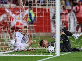 Toronto FC goalkeeper Quentin Westberg (16) reacts after a goal by New York Red Bulls midfielder Luquinhas (not pictured) in front of Toronto FC defender Shane O'Neill (27) during the second at Red Bull Arena.
